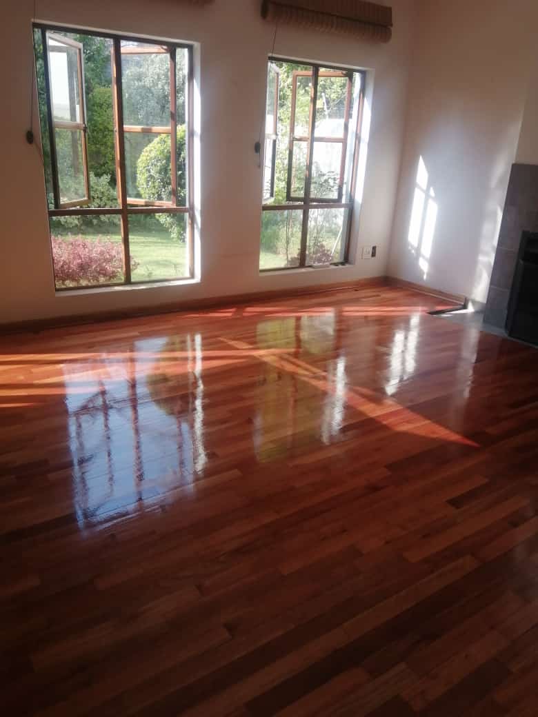 Warm hardwood flooring in a residential living room